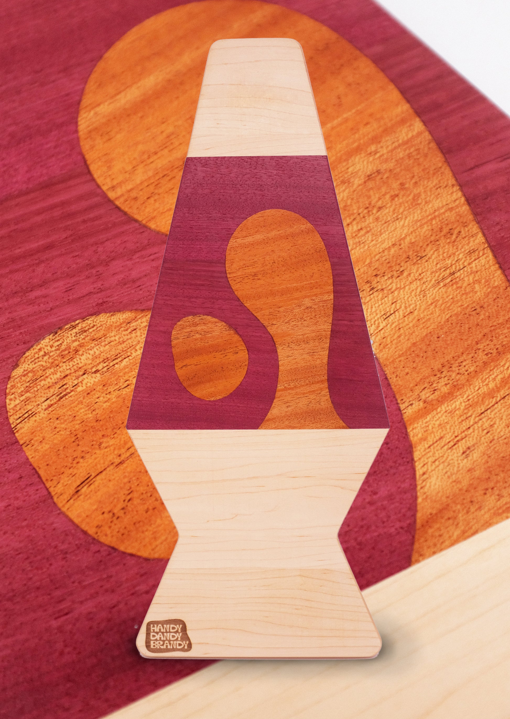 lava lamp shaped cutting board made of purpleheart, maple and mahogany