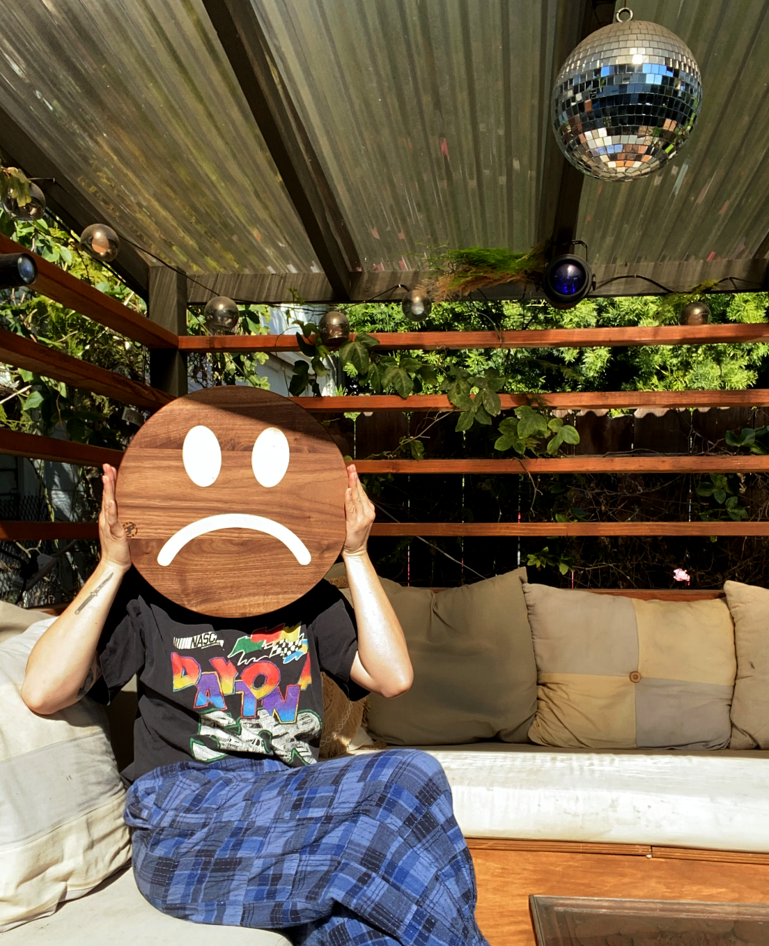 sad face cutting board made of walnut