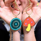 mushroom and saw blade enamel keychain