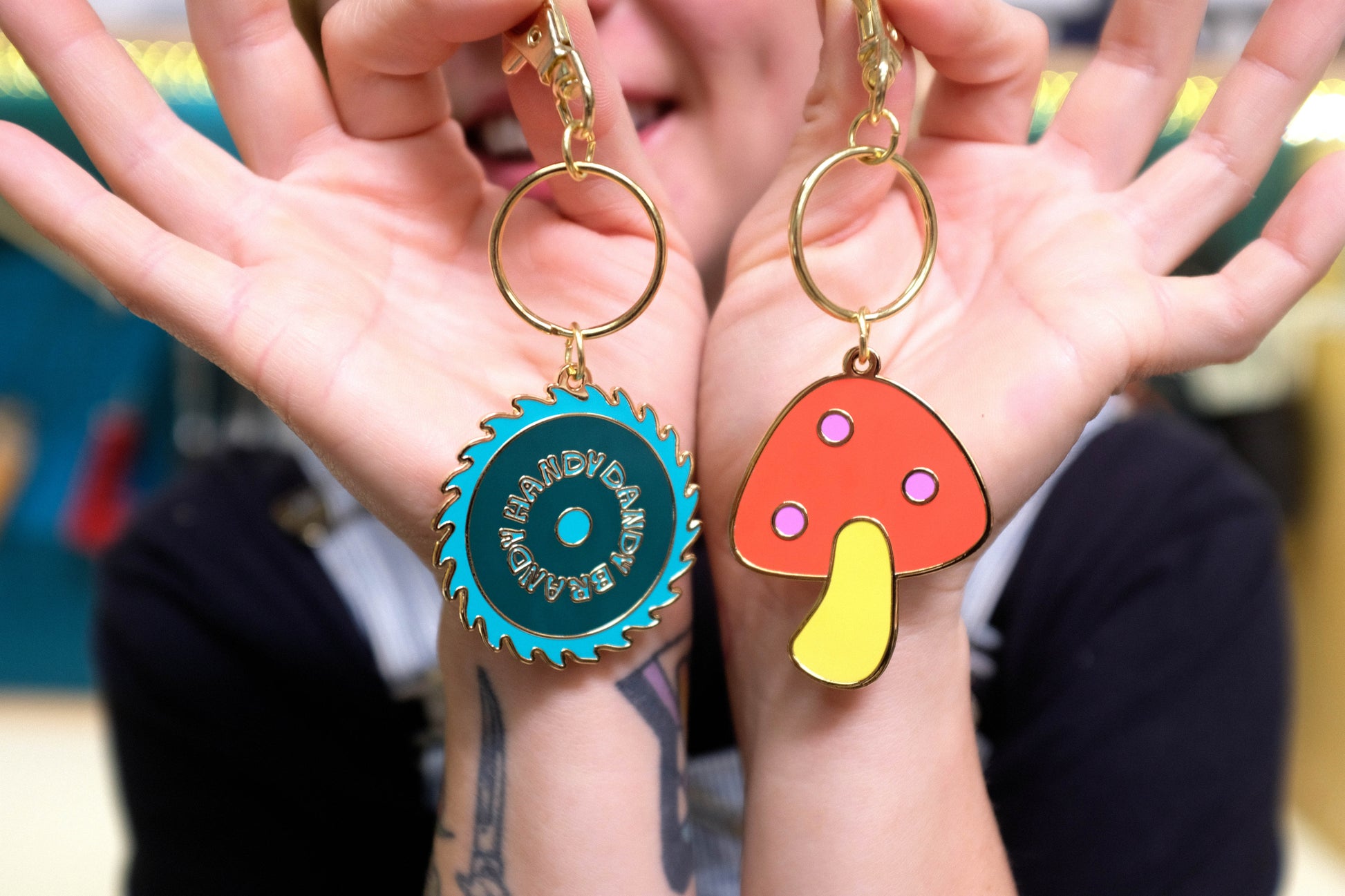 mushroom and saw blade enamel keychain