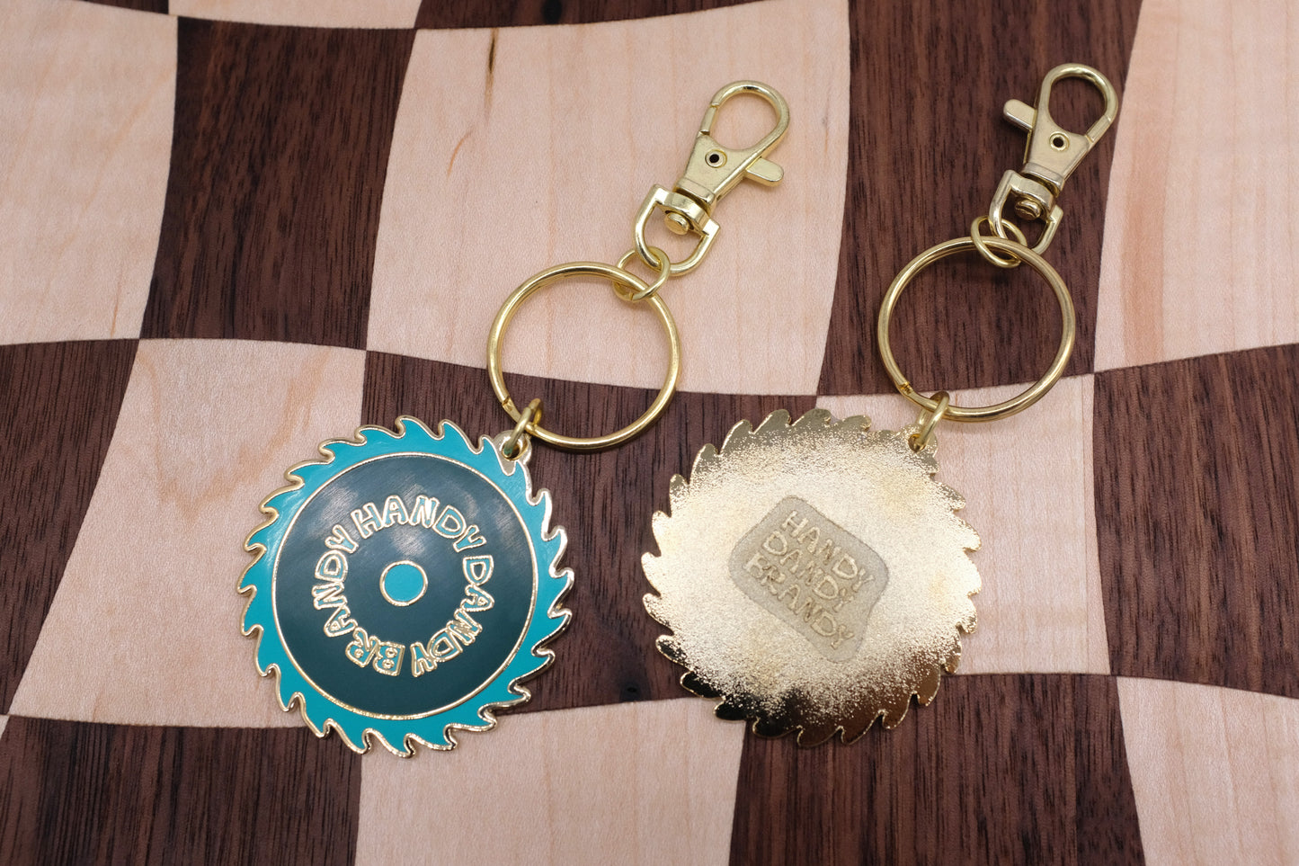 mushroom and saw blade enamel keychain