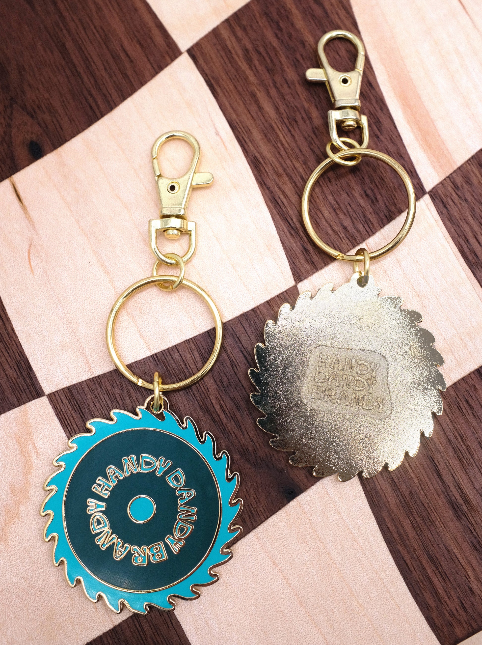 mushroom and saw blade enamel keychain