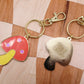mushroom and saw blade enamel keychain
