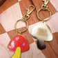 mushroom and saw blade enamel keychain