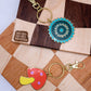 mushroom and saw blade enamel keychain