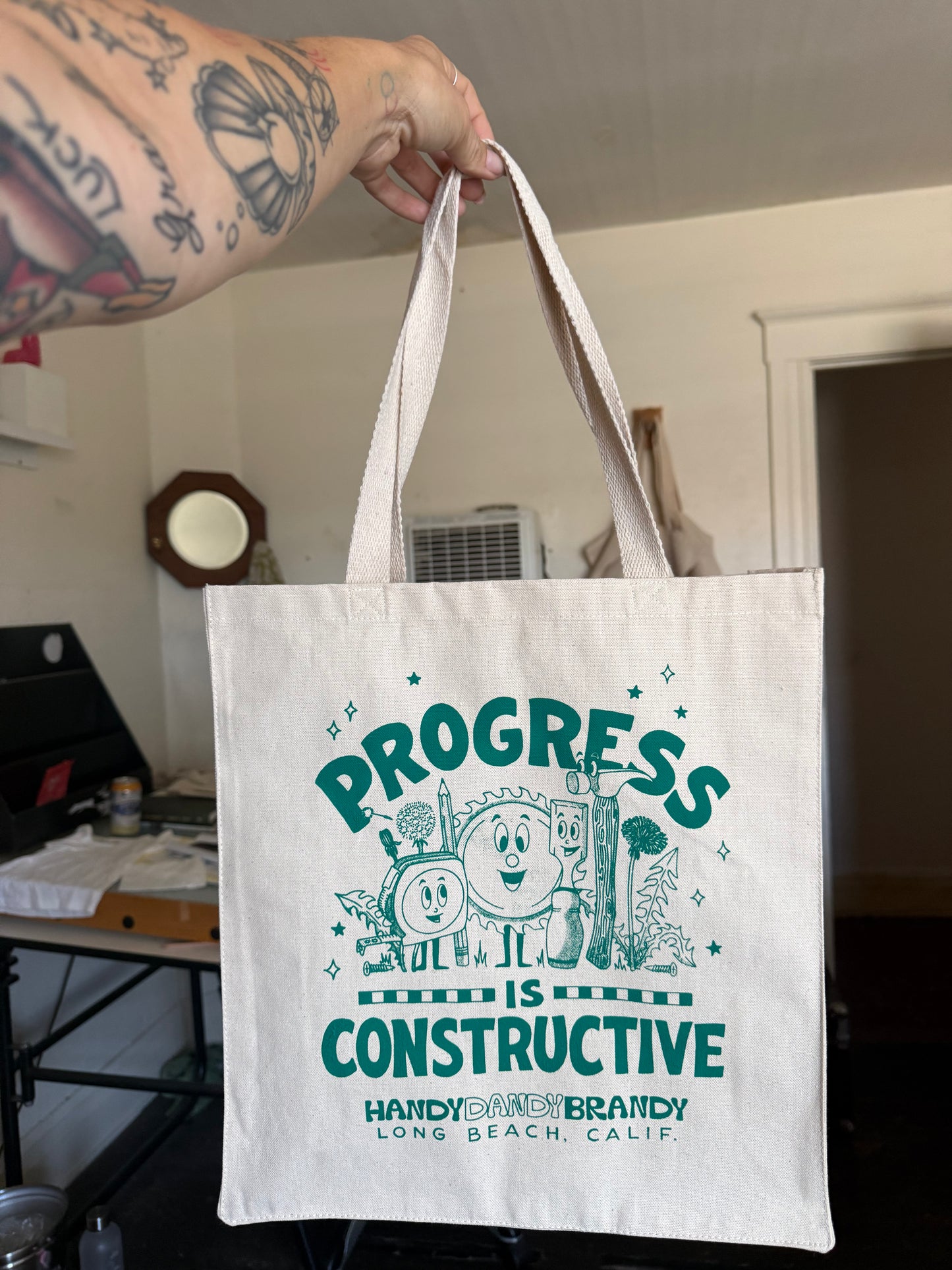 Progress is Constructive Tote Bag