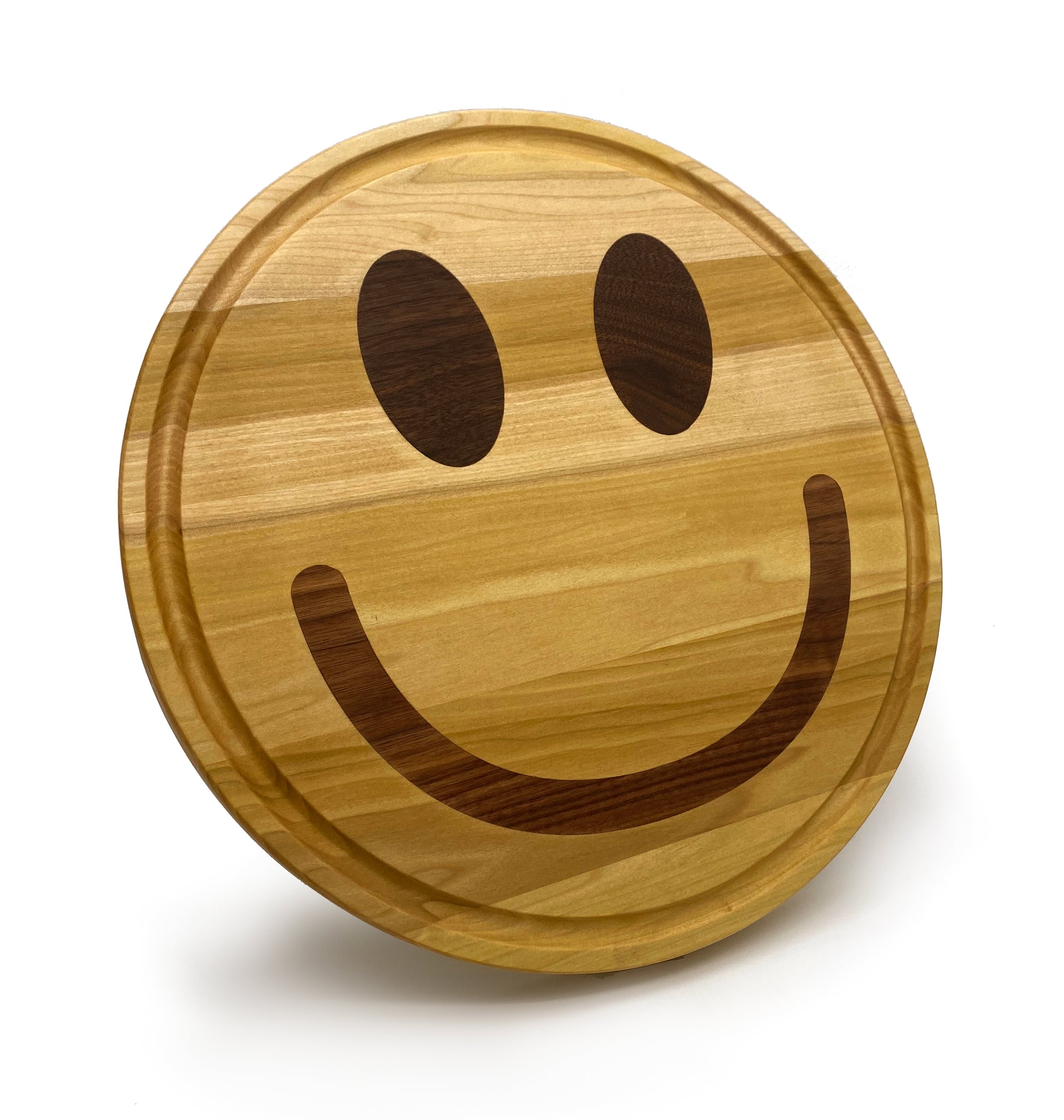 smiley face shapes cutting board made of poplar